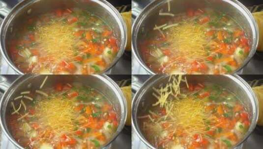准备蔬菜和意大利面汤高清在线视频素材下载