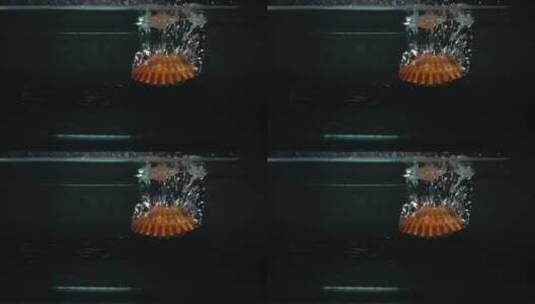 海鲜扇贝落入水中高清在线视频素材下载