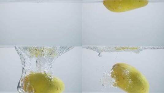 酸甜香软的芒果落入水中棚拍高清在线视频素材下载