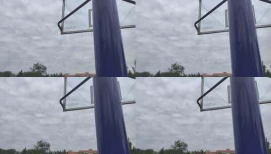 阴天篮球框的背面高清在线视频素材下载