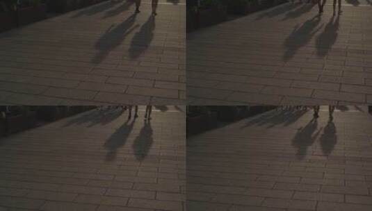 步行道上的行人影子高清在线视频素材下载