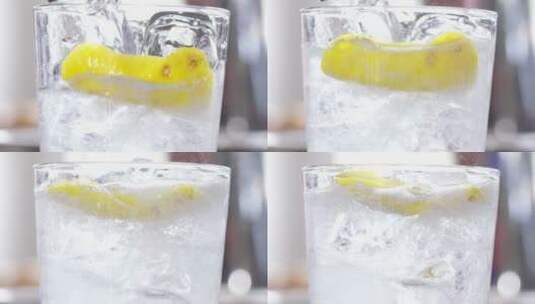 欧洲酒吧 柠檬苏打水 冰块 水倒入气泡高清在线视频素材下载