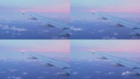 从飞机窗户看粉红色的日落高清在线视频素材下载
