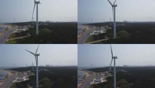 航拍山东威海海岸线公路风车唯美风光高清在线视频素材下载