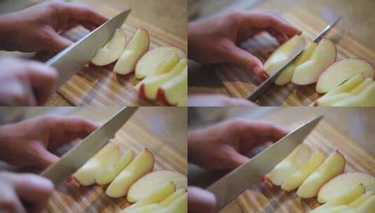 慢镜头拍摄一个人用刀把苹果切成小块高清在线视频素材下载