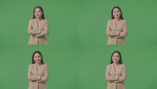 亚洲商业女性交叉手臂和温暖的微笑在绿屏背景在工作室高清在线视频素材下载