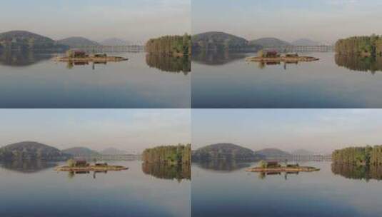 武汉东湖航拍湖心岛湖面蓝天高清在线视频素材下载