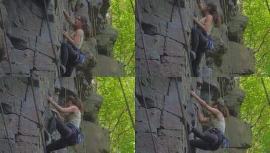 女人攀登山上的岩石高清在线视频素材下载