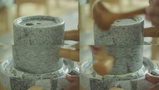 清洗传统石磨做豆腐高清在线视频素材下载
