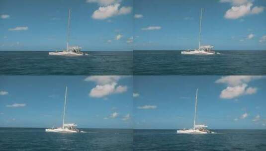 在阳光明媚的日子里在公海上的帆船高清在线视频素材下载