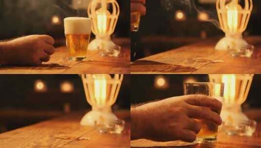 男人在酒吧拿起啤酒杯子高清在线视频素材下载