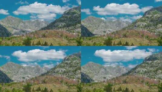 格里巴杰黑山山谷中带云的精确山脉的延时视图高清在线视频素材下载