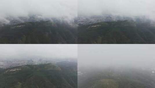 5K-云雾缭绕的长虫山，长虫山俯瞰昆明市区高清在线视频素材下载