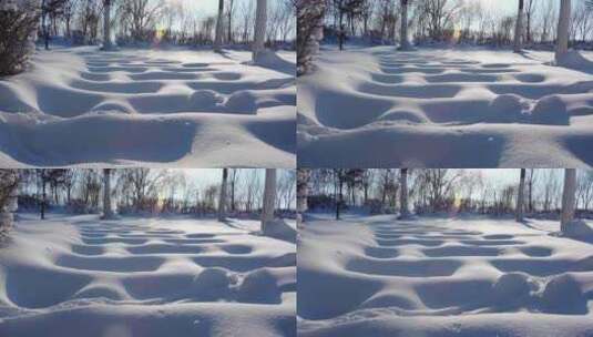 冬天雪地覆盖的公园步道高清在线视频素材下载