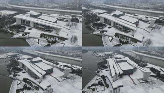 武汉汉阳区琴台大剧院雪景航拍高清在线视频素材下载