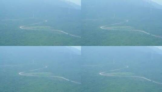 雾气笼罩山林道路高清在线视频素材下载