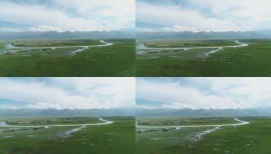 新疆夏季草原风景弯弯的小河流过蓝天下草地高清在线视频素材下载