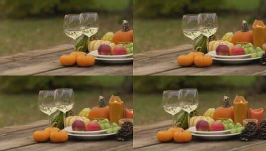 秋季户外大自然的概念。在木桌上倒水果。高清在线视频素材下载