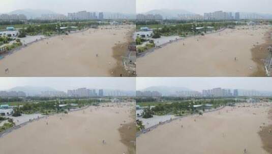 宁波北仑梅山湾沙滩公园滨海万人沙滩4K航拍高清在线视频素材下载