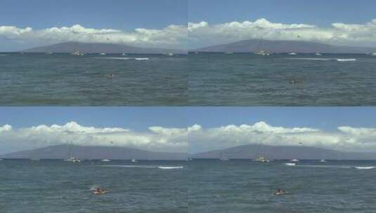 航拍游客在海上冲浪高清在线视频素材下载