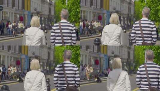 跟踪拍摄情侣在街头散步高清在线视频素材下载