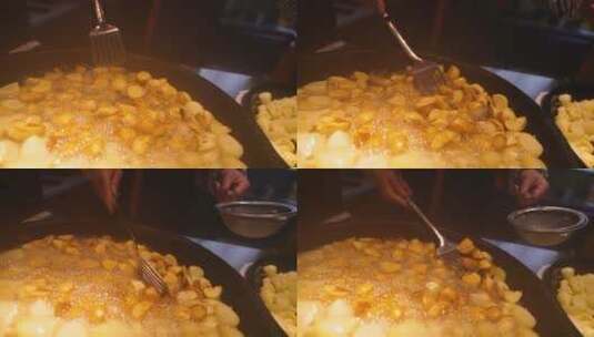 慢镜头升格摄影城市宵夜美食小吃油炸小土豆高清在线视频素材下载