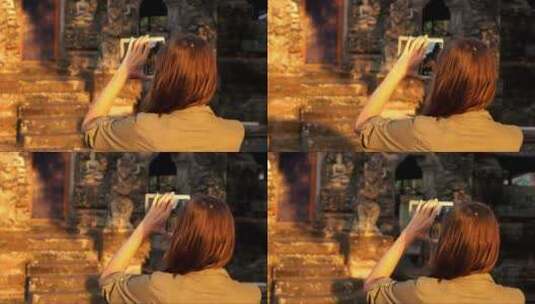 在巴厘岛用手机拍摄亚洲寺庙的照片高清在线视频素材下载