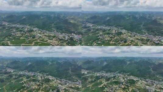 航拍云海下的山脉乡村小镇高清在线视频素材下载