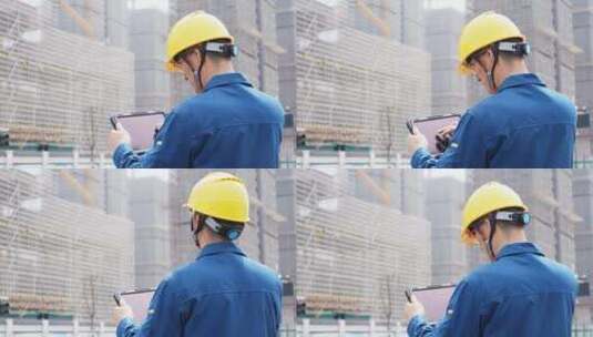 建筑工人工程师技术人员在工地使用平板电脑高清在线视频素材下载