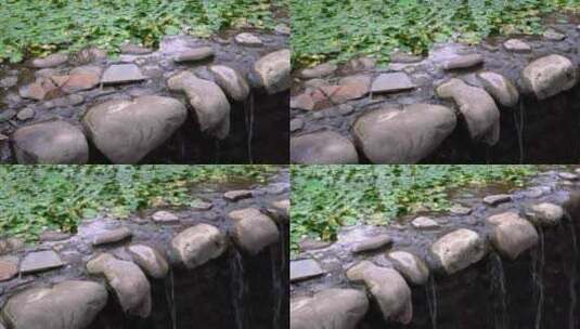 水流从岩石上的瀑布流过下高清在线视频素材下载
