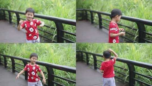 中国小男孩在公园里跳舞高清在线视频素材下载
