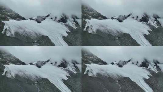 航拍四川甘孜贡嘎山卫峰乌库楚雪山风光高清在线视频素材下载