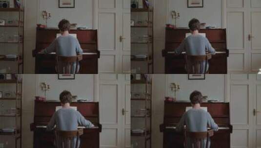 男孩在练钢琴高清在线视频素材下载