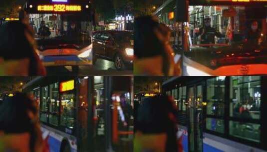 城市夜晚车水马龙公交车进出站高清在线视频素材下载