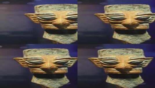 三星堆商代晚期金面具辫发青铜人头像高清在线视频素材下载