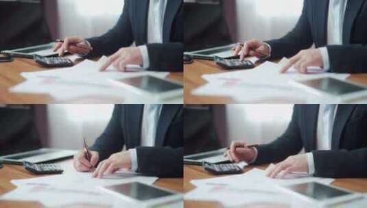 财务分析师会计师在办公桌上的手特写计算器高清在线视频素材下载