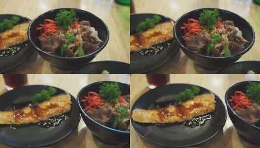 Gyudon牛肉配米饭和咸烤三文鱼，日本高清在线视频素材下载