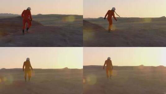 宇航员，沙漠，橙色工作服，宇航员头盔高清在线视频素材下载