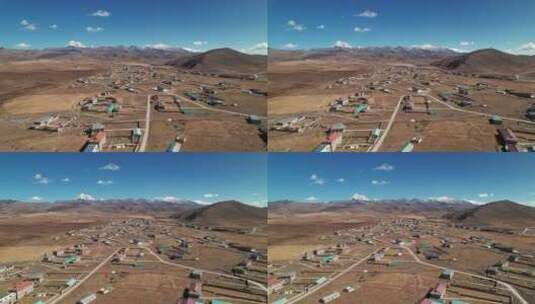 川西塔公草原的藏族村庄航拍高清在线视频素材下载