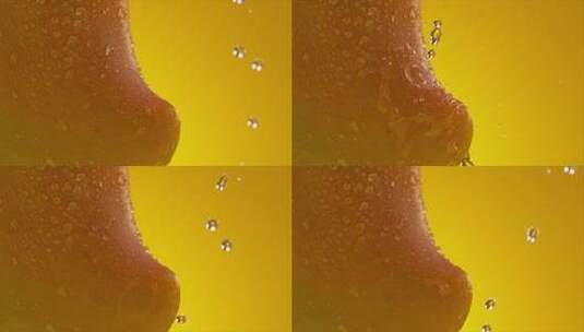 芬腾高速机1000fps之芒果水滴滴落高清在线视频素材下载