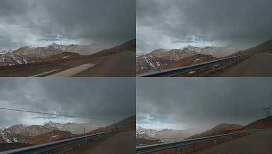 西藏旅游风光219国道车窗外雨雾雪山高清在线视频素材下载