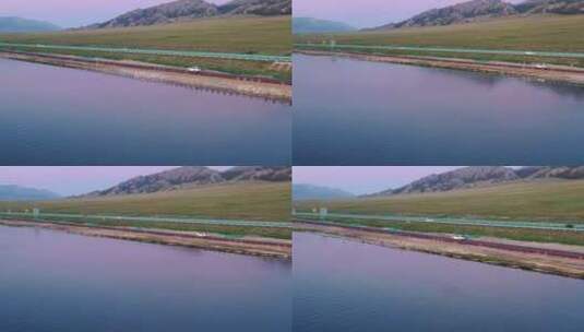 航拍汽车公路行驶新疆赛里木湖风景自然风光高清在线视频素材下载