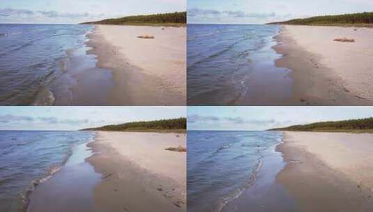 波罗的海沙滩上海浪的鸟瞰图。4K慢动作无人机海浪裂缝的镜头高清在线视频素材下载