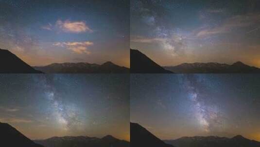 银河系的时间流逝和夏季夜空中的星星在阿尔卑斯山上空旋转高清在线视频素材下载