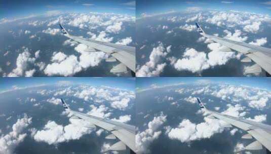 飞机在蓝天白云中飞行高清在线视频素材下载