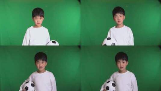 帅气的中国小男孩在玩足球慢镜头高清在线视频素材下载
