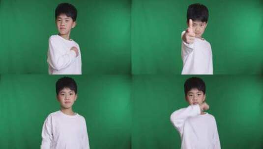 帅气的中国小男孩做手势比个枪8K实拍高清在线视频素材下载