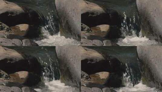 水落在岩石之间高清在线视频素材下载