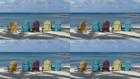 海滩上的五颜六色的椅子高清在线视频素材下载