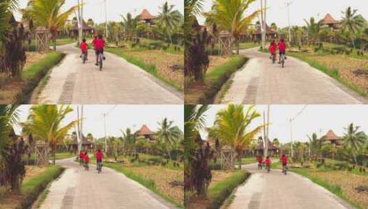 巴厘岛原住民儿童骑车高清在线视频素材下载
